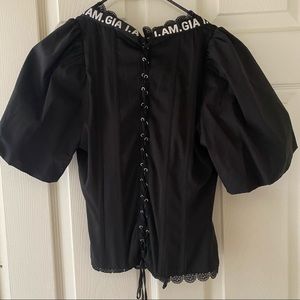 I am GIA corset black top with puffy sleeves